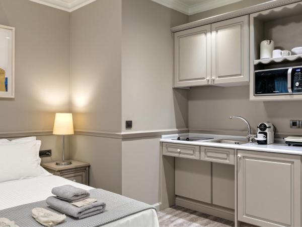 Estia Boutique Apartments : photo 1 de la chambre studio lit king-size