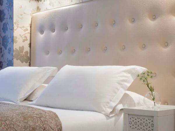 Hôtel Plaza Étoile : photo 1 de la chambre chambre double ou lits jumeaux club