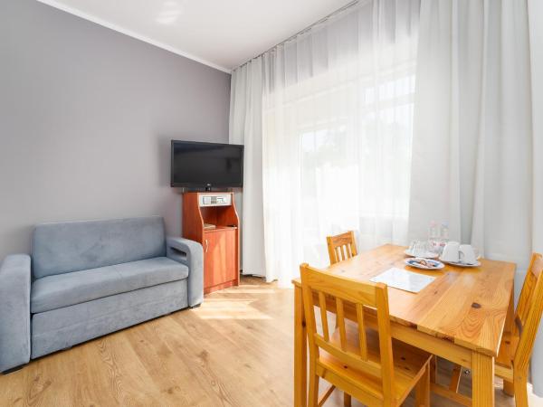 Ośrodek Wypoczynkowy Wiga : photo 3 de la chambre suite avec balcon