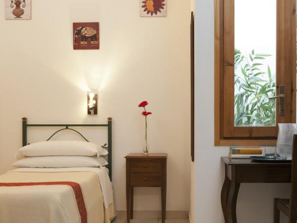 Cagliari Novecento : photo 1 de la chambre chambre simple