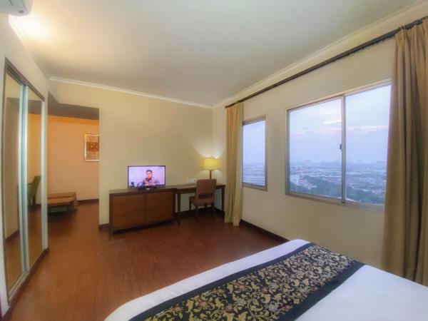 Ancol Marina Residence : photo 7 de la chambre chambre lit queen-size deluxe