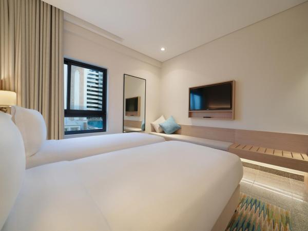 Arabian Park Dubai, an Edge by Rotana Hotel : photo 2 de la chambre chambre lits jumeaux - vue sur ville