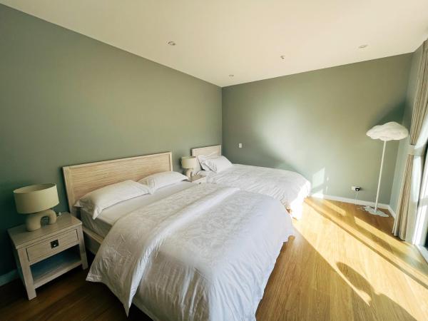 Echo Lodge : photo 2 de la chambre chambre lits jumeaux - vue sur jardin