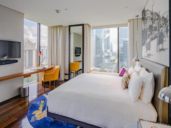 Hotel Indigo Bangkok Wireless Road, an IHG Hotel : photo 6 de la chambre chambre lit king-size d'angle standard avec balcon - vue sur jardin