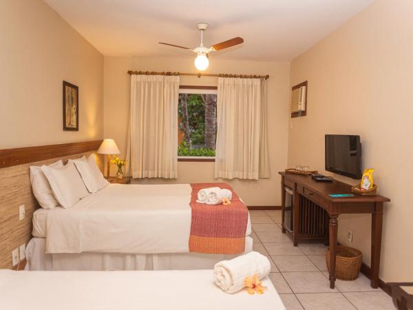 Pousada Corsario Buzios : photo 2 de la chambre chambre triple - vue sur jardin