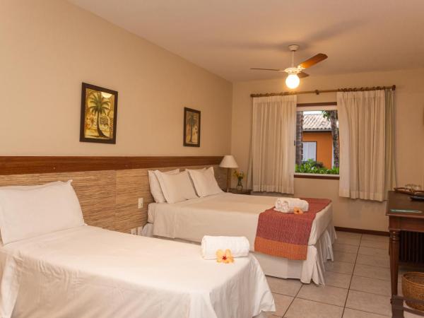 Pousada Corsario Buzios : photo 1 de la chambre chambre triple - vue sur jardin