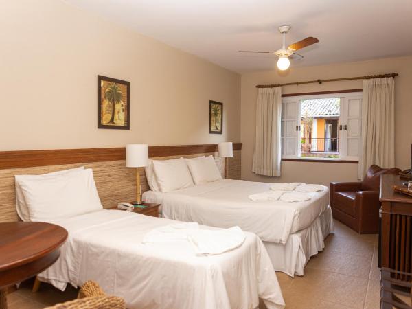 Pousada Corsario Buzios : photo 3 de la chambre chambre triple - vue sur jardin