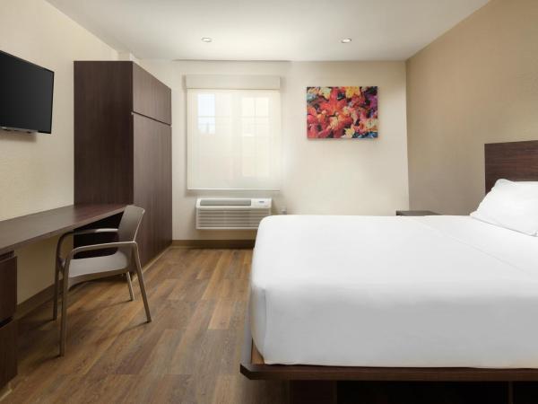 Extended Suites Merida Siglo XXI : photo 3 de la chambre suite lit queen-size