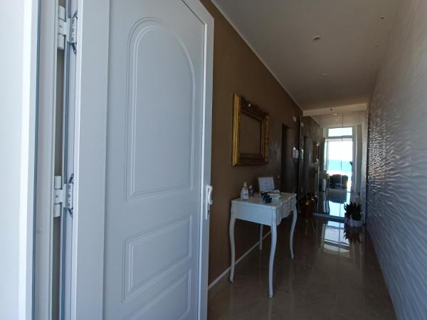 Ventidue Venti : photo 1 de la chambre chambre lit king-size avec baignoire spa