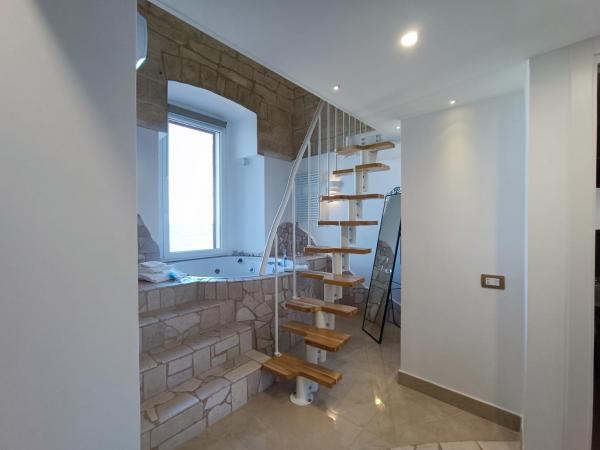 Ventidue Venti : photo 5 de la chambre chambre lit king-size avec baignoire spa