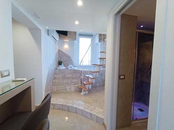 Ventidue Venti : photo 4 de la chambre chambre lit king-size avec baignoire spa