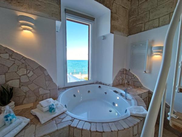 Ventidue Venti : photo 10 de la chambre chambre lit king-size avec baignoire spa