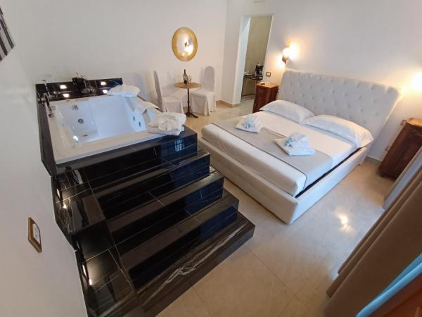 Ventidue Venti : photo 6 de la chambre chambre lit queen-size avec baignoire spa