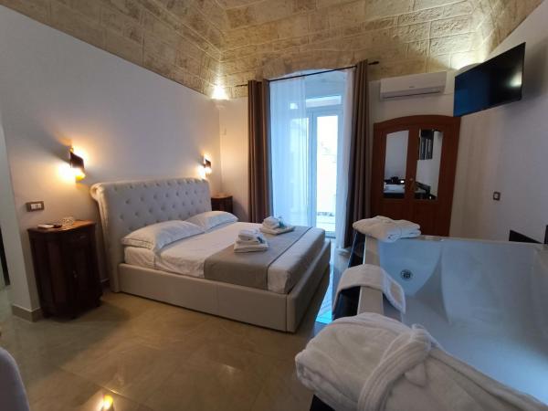 Ventidue Venti : photo 10 de la chambre chambre lit queen-size avec baignoire spa