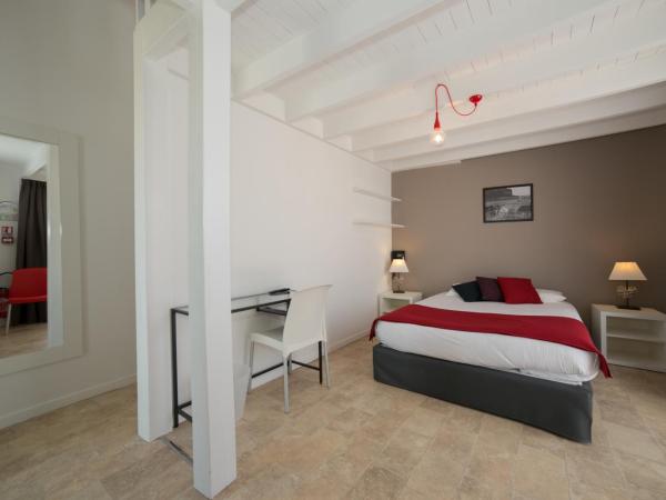 La Villa en L'île - 2 Piscines & Spa : photo 1 de la chambre suite en duplex