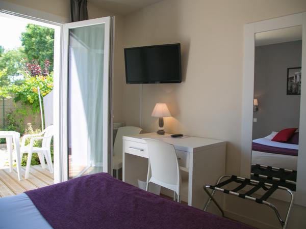 La Villa en L'île - 2 Piscines & Spa : photo 7 de la chambre chambre double avec terrasse