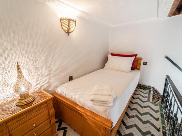 Riad Taj Salma : photo 3 de la chambre chambre triple standard