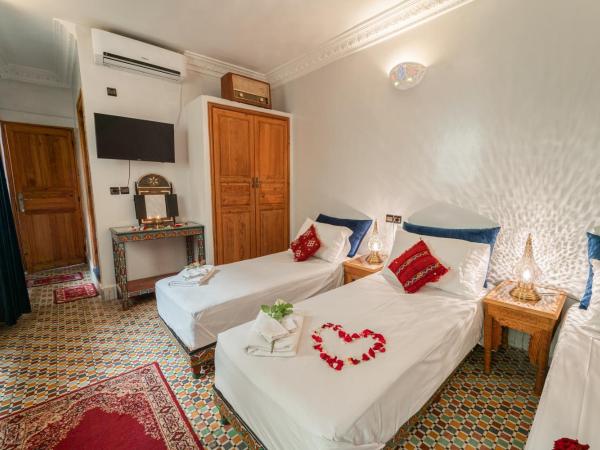 Riad Taj Salma : photo 1 de la chambre chambre triple standard