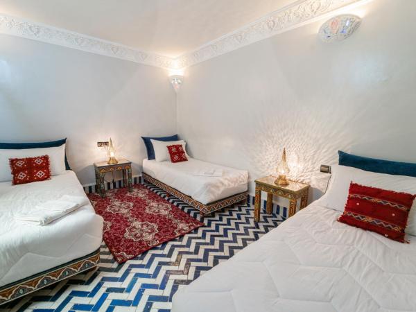 Riad Taj Salma : photo 6 de la chambre chambre triple standard