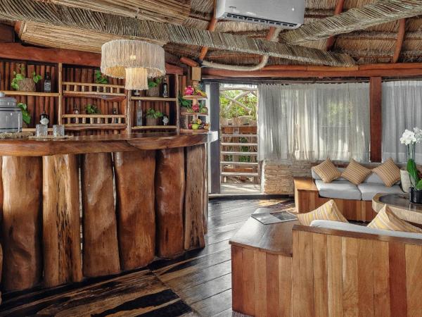 Kanan Tulum Treehouse, Rooftop, Beach Club & Spa - Adults Only : photo 4 de la chambre suite lit king-size signature arrondie - vue sur jardin