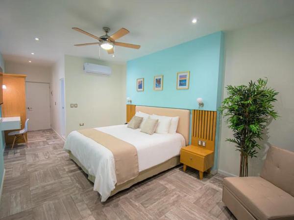 Bartolome Oceanfront Suites : photo 1 de la chambre chambre double deluxe avec balcon