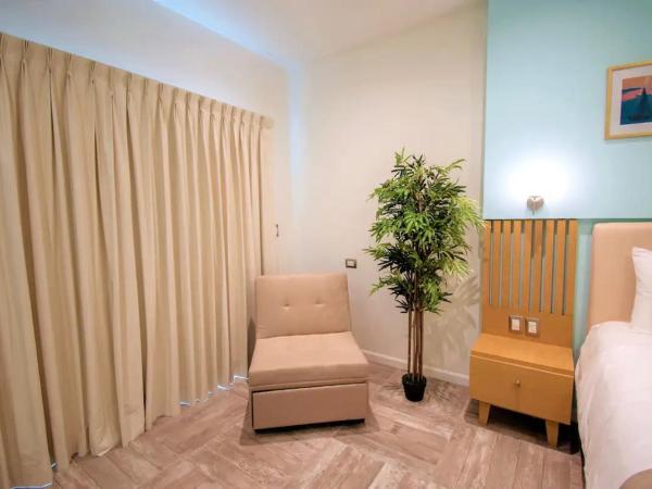 Bartolome Oceanfront Suites : photo 2 de la chambre chambre double deluxe avec balcon