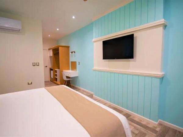 Bartolome Oceanfront Suites : photo 3 de la chambre chambre double deluxe avec balcon