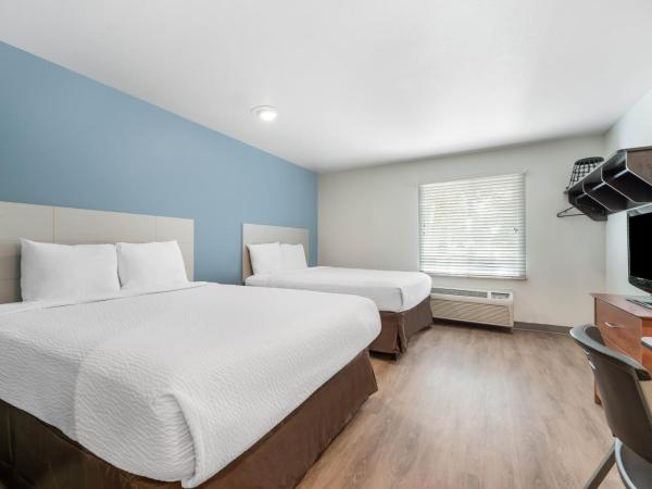 Extended Stay America Select Suites - Orlando - East : photo 7 de la chambre chambre lit queen-size
