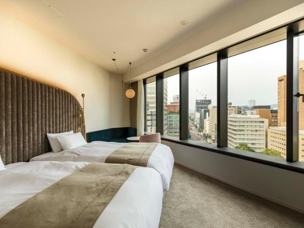 THE KNOT HIROSHIMA : photo 1 de la chambre chambre lits jumeaux deluxe - vue panoramique sur ville