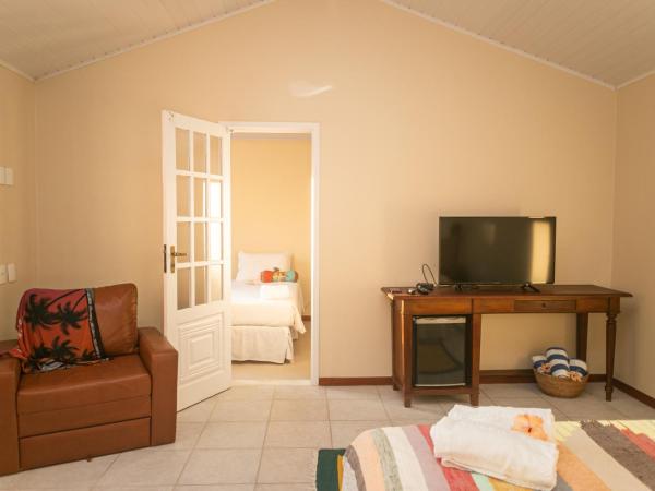 Pousada Corsario Buzios : photo 1 de la chambre suite familiale