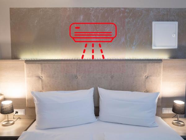 Alpha & Omega Hotel : photo 3 de la chambre chambre simple