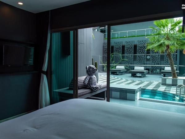 foto Hotel Phuket : photo 2 de la chambre hébergement ozone hall avec baignoire - accès piscine