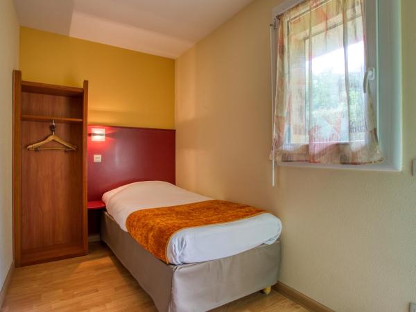 Abbys Hotel : photo 9 de la chambre chambre lits jumeaux pour personnes à mobilité réduite