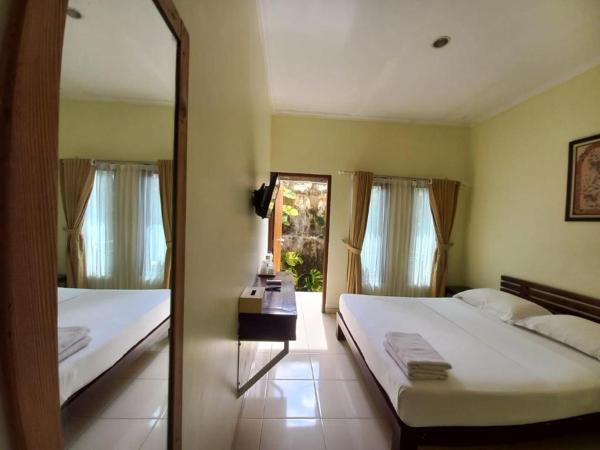 Puri Pangeran Hotel : photo 3 de la chambre chambre double ou lits jumeaux standard