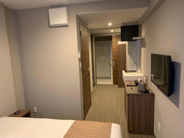 C＆Jホテル : photo 7 de la chambre chambre lit king-size