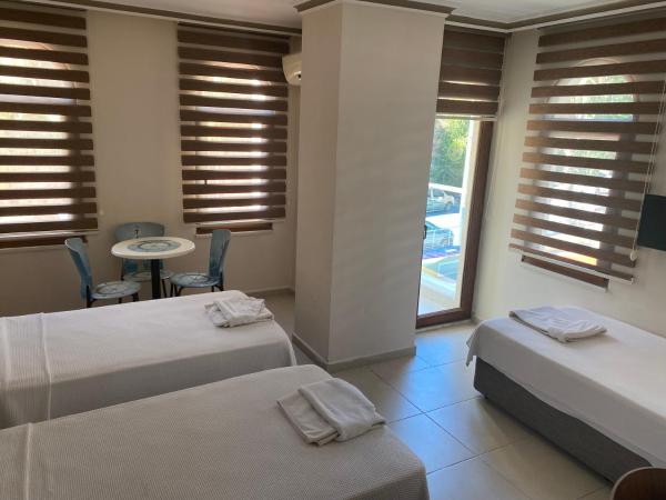 Astoria Beach Hotel : photo 1 de la chambre chambre triple deluxe