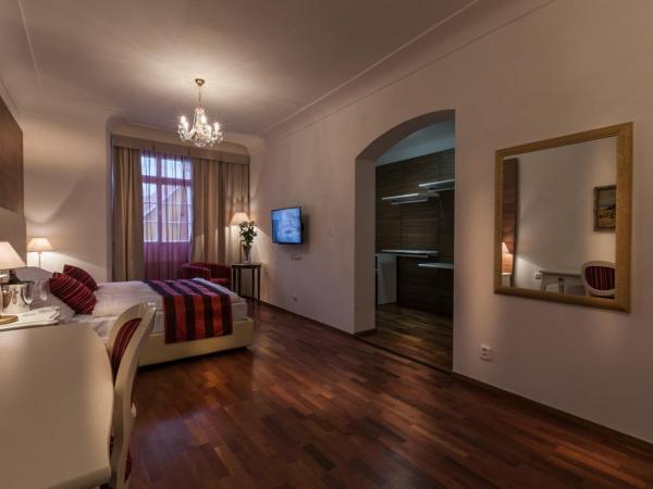 Little King U Malvaze : photo 4 de la chambre chambre triple exécutive