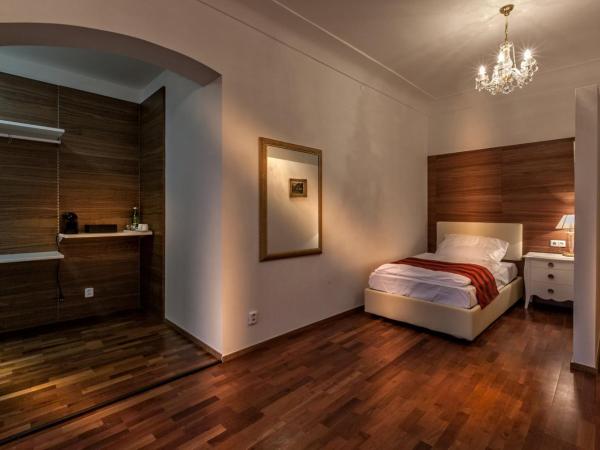 Little King U Malvaze : photo 6 de la chambre chambre triple exécutive