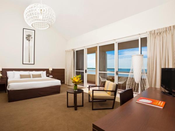 Cairns Harbourside Hotel : photo 6 de la chambre suite lit king-size - front de mer