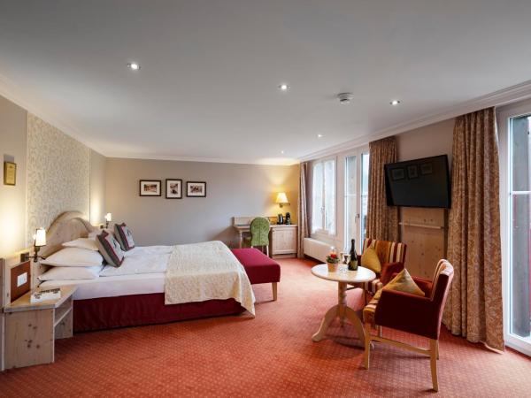 Romantik Hotel Schweizerhof : photo 1 de la chambre suite junior - vue sur eiger