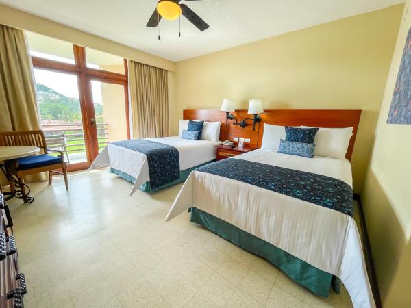 Pierre Mundo Imperial Riviera Diamante Acapulco : photo 5 de la chambre chambre double supérieure avec deux lits doubles