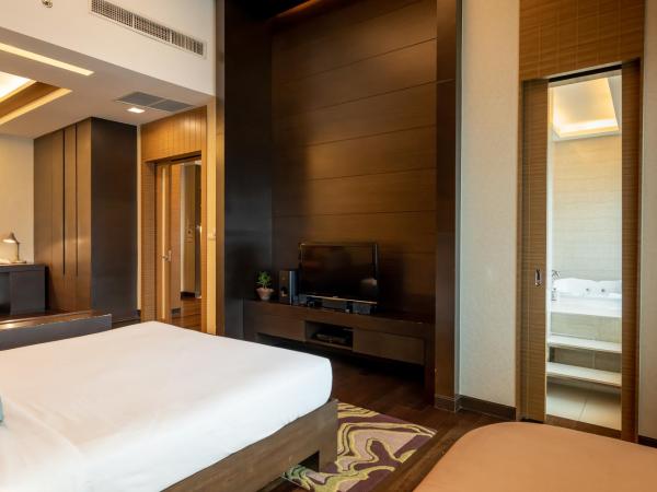 Jasmine Resort Bangkok : photo 5 de la chambre suite avec baignoire spa