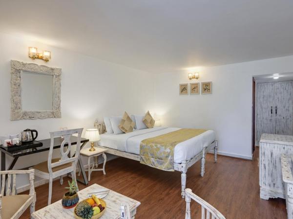 Swaroop Vilas - Lake Facing Boutique Hotel : photo 10 de la chambre chambre double - vue sur jardin