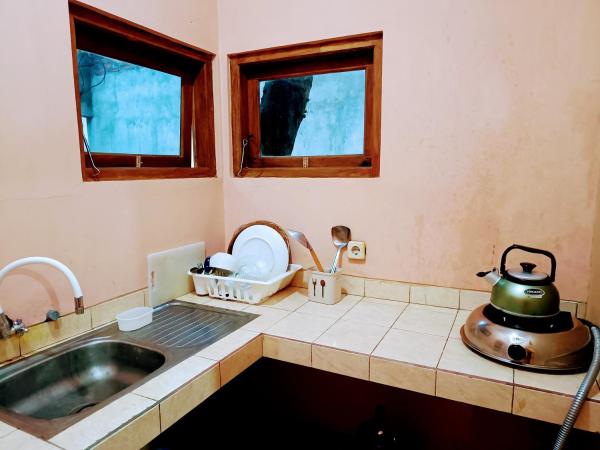 Ada Waktu Homestay : photo 1 de la chambre bungalow familial