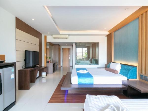 Mai Morn Resort SHA Plus : photo 6 de la chambre chambre lit king-size - vue sur piscine 