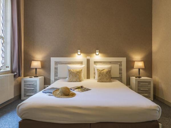 CERISE Royan - Le Grand Hôtel de la Plage : photo 3 de la chambre chambre double ou lits jumeaux - vue sur ville