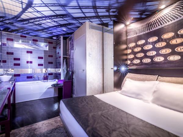 Apostrophe Hôtel : photo 1 de la chambre chambre double balneo avec baignoire de chromothérapie