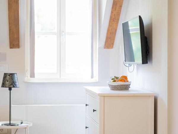 Paon Boutique Apartments : photo 9 de la chambre studio lit king-size avec canapé-lit