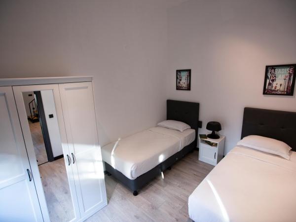 Cityloft 161 : photo 4 de la chambre chambre lits jumeaux - vue sur jardin