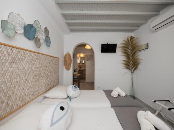 Aperto Apartments : photo 7 de la chambre chambre lits jumeaux avec salle de bains